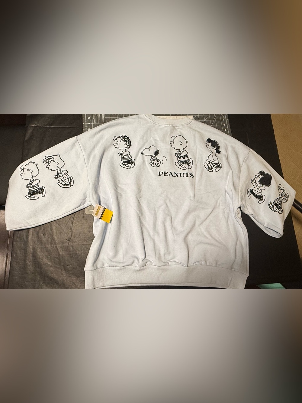 Peanuts Oversized Crew Neck Sweatshirt with Embroidered Red Snoopy Doghouse - Picture 2 of 6